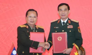 Việt Nam - Lào ký nghị định thư hợp tác quốc phòng song phương